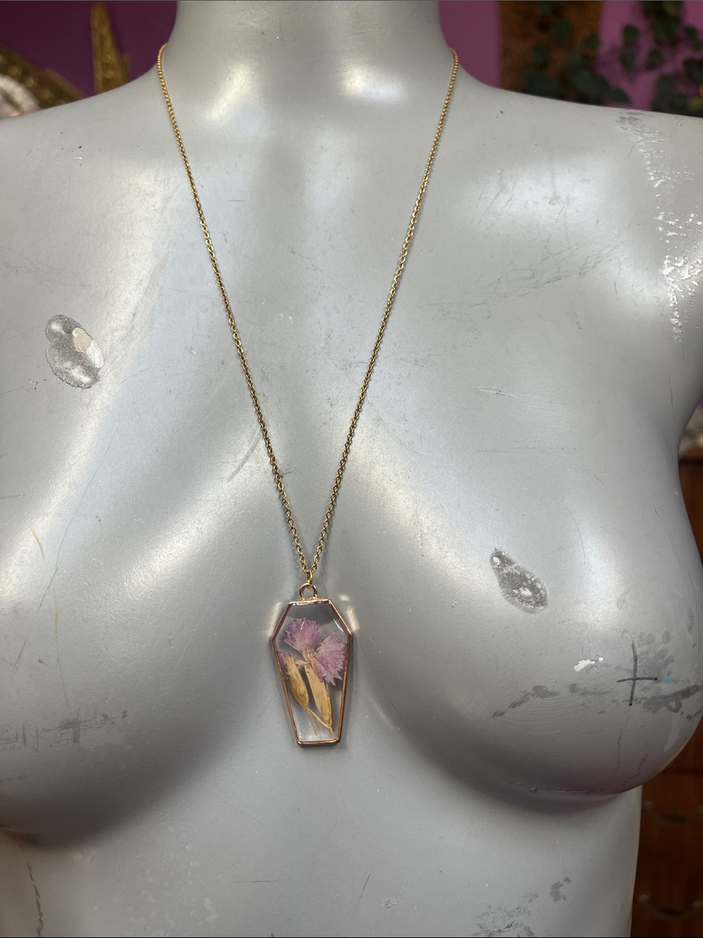 Purple pressed flower gold tones Coffin necklace